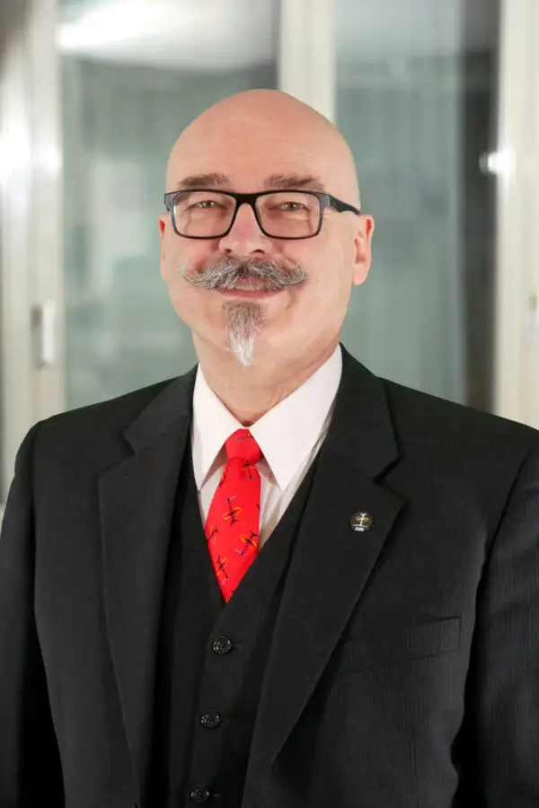 a man in a suit and tie